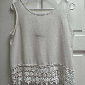 White sleeveless top with crochet detailing